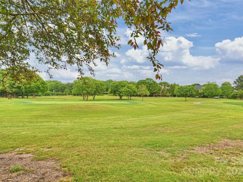 5940 Four Wood Drive, Matthews, NC 28104.  MLS# CAR4252079, YatesRealty ID 19844. Overlooking the 8th green!
