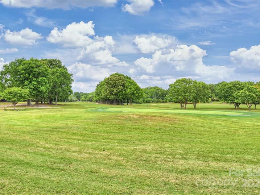 5940 Four Wood Drive, Matthews, NC 28104.  MLS# CAR4252079, YatesRealty ID 19844. Overlooking the 8th green!