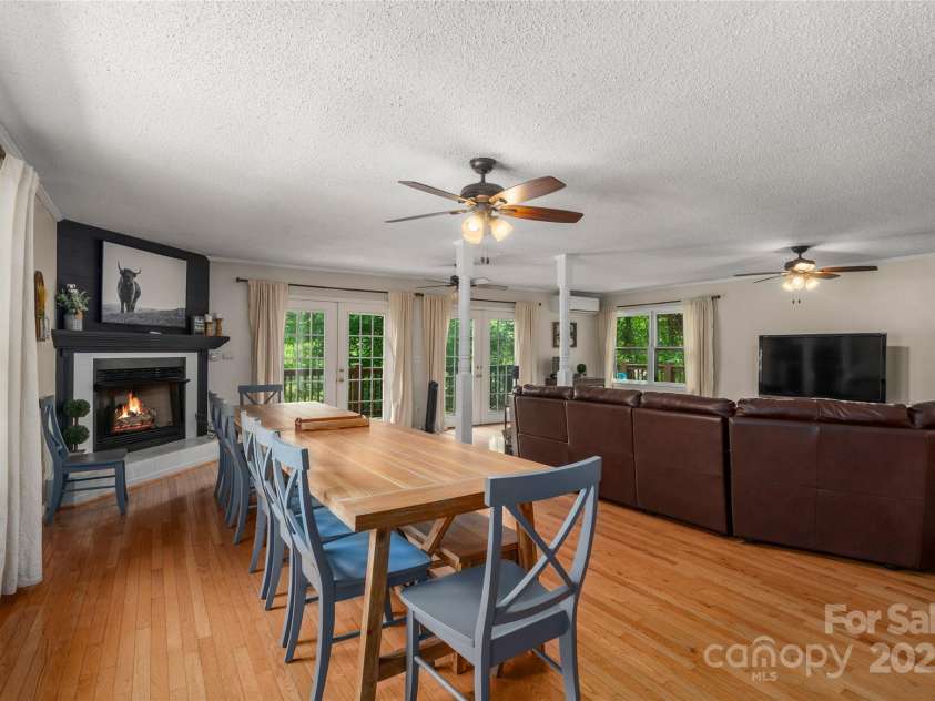 307 Nottingham Road, Maggie Valley, NC 28751.  MLS# CAR4264017, YatesRealty ID 19846. Dining table to 12 people