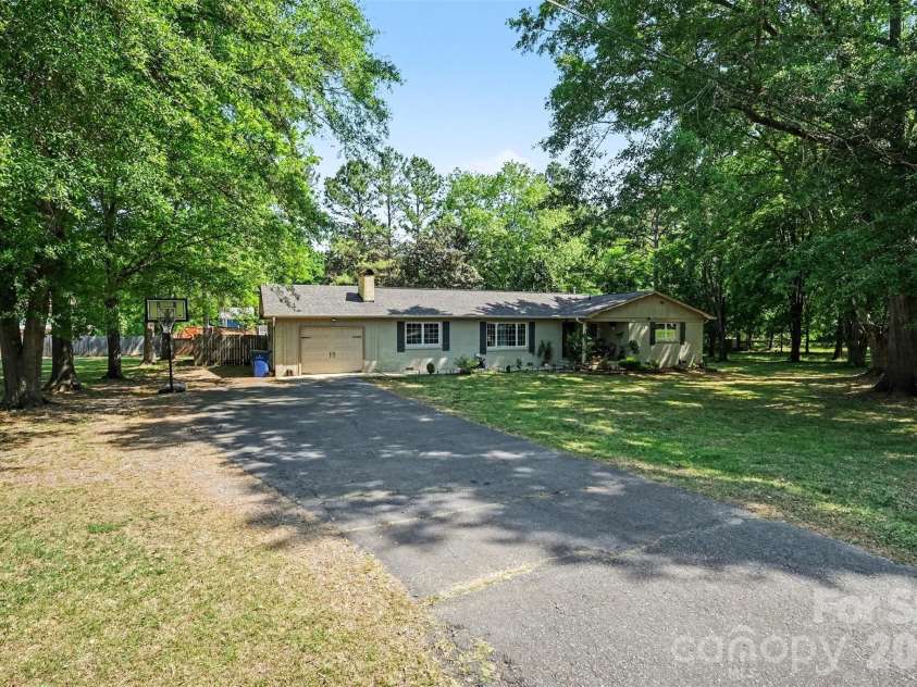 3950 Rocky River Place, Harrisburg, NC 28075.  MLS# CAR4376828, YatesRealty ID 19852. 