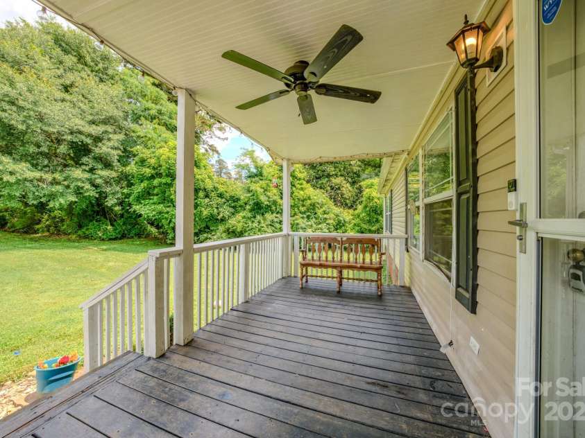 210 US 221A Highway, Forest City, NC 28043.  MLS# CAR4264127, YatesRealty ID 19853. Front covered porch