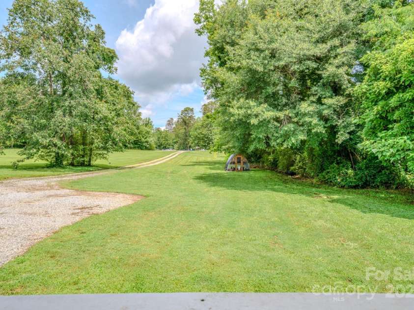 210 US 221A Highway, Forest City, NC 28043.  MLS# CAR4264127, YatesRealty ID 19853. Front yard