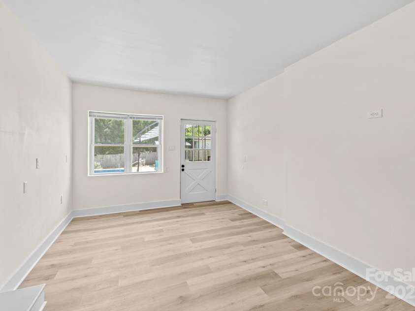 306 2nd Avenue Place, Conover, NC 28613.  MLS# CAR4270628, YatesRealty ID 19854. Family room, door to deck and pool