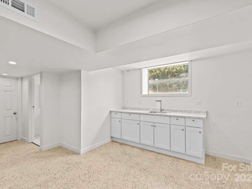 306 2nd Avenue Place, Conover, NC 28613.  MLS# CAR4270628, YatesRealty ID 19854. Finished basement