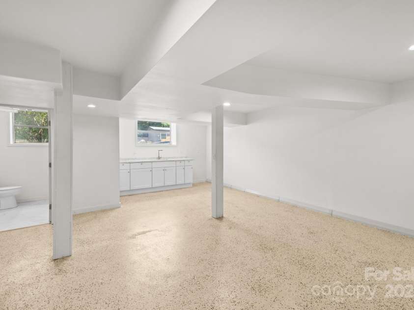 306 2nd Avenue Place, Conover, NC 28613.  MLS# CAR4270628, YatesRealty ID 19854. Finished basement