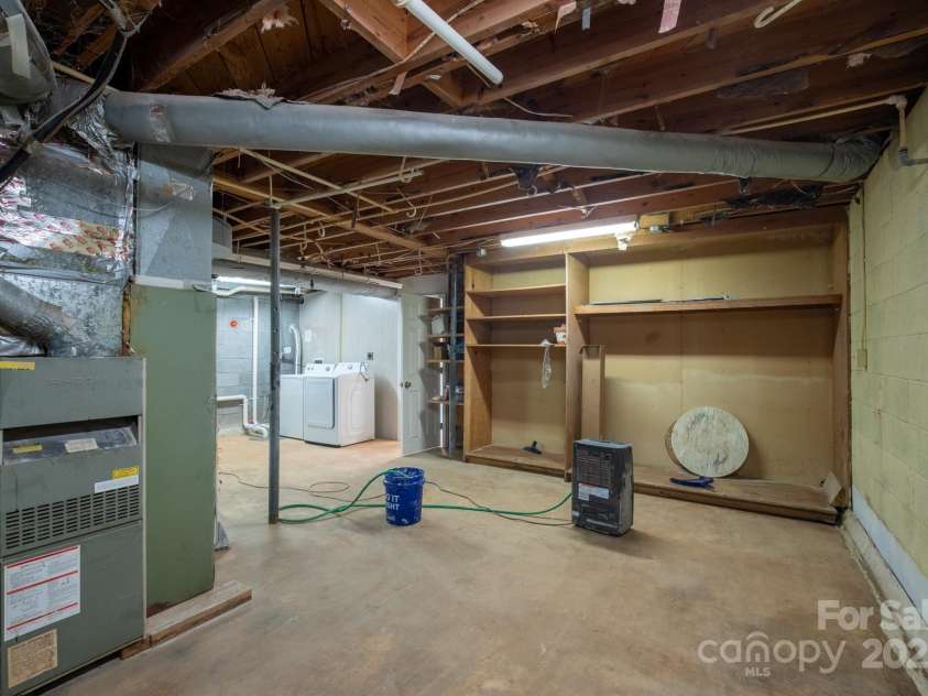 306 2nd Avenue Place, Conover, NC 28613.  MLS# CAR4270628, YatesRealty ID 19854. Unfinished part of basement