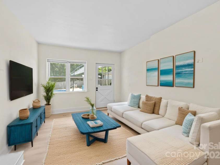 306 2nd Avenue Place, Conover, NC 28613.  MLS# CAR4270628, YatesRealty ID 19854. Virtually staged family room