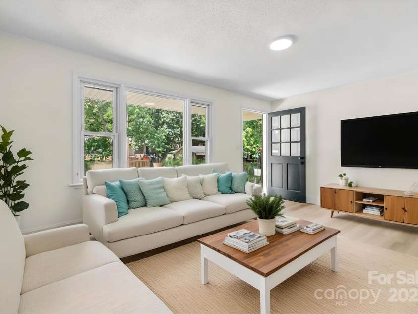 306 2nd Avenue Place, Conover, NC 28613.  MLS# CAR4270628, YatesRealty ID 19854. Virtually staged living room