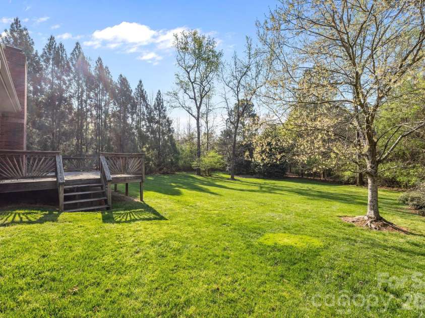 3325 Tilley Morris Road, Matthews, NC 28105.  MLS# CAR4372794, YatesRealty ID 19855. 