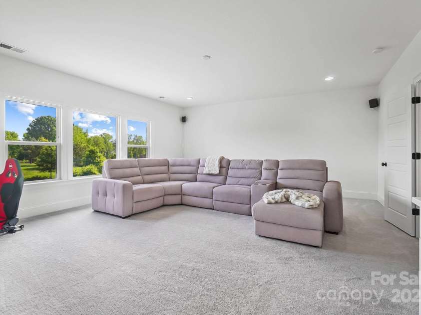 1005 Grand Oak Drive, Waxhaw, NC 28173.  MLS# CAR4253613, YatesRealty ID 19856. Bonus room with wet bar