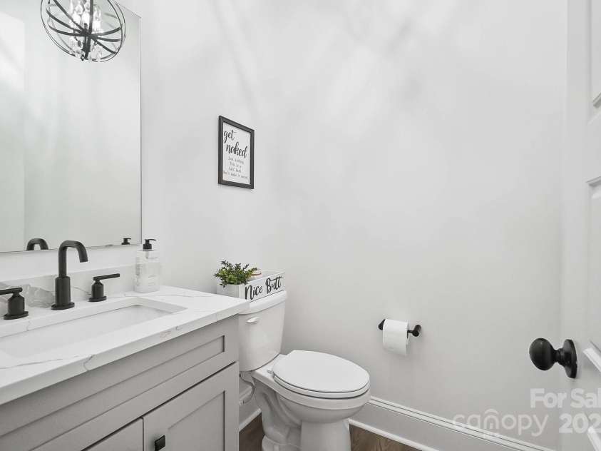 1005 Grand Oak Drive, Waxhaw, NC 28173.  MLS# CAR4253613, YatesRealty ID 19856. Downstairs powder room
