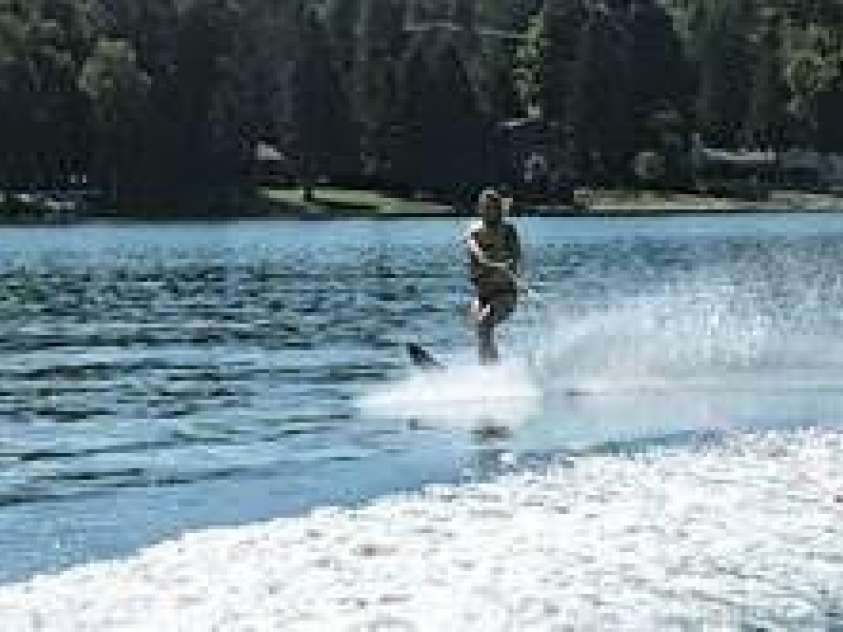 4399 Reed Creek Drive, Sherrills Ford, NC 28673.  MLS# CAR4225911, YatesRealty ID 19857. Skiing on the lake