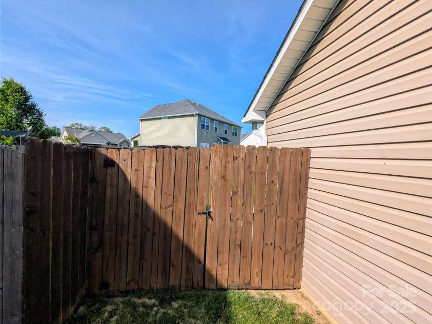 163 Swift Creek Road, Fletcher, NC 28732.  MLS# CAR4250145, YatesRealty ID 19860. Backyard gate