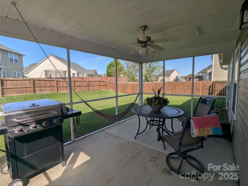 163 Swift Creek Road, Fletcher, NC 28732.  MLS# CAR4250145, YatesRealty ID 19860. Backyard screened in porch
