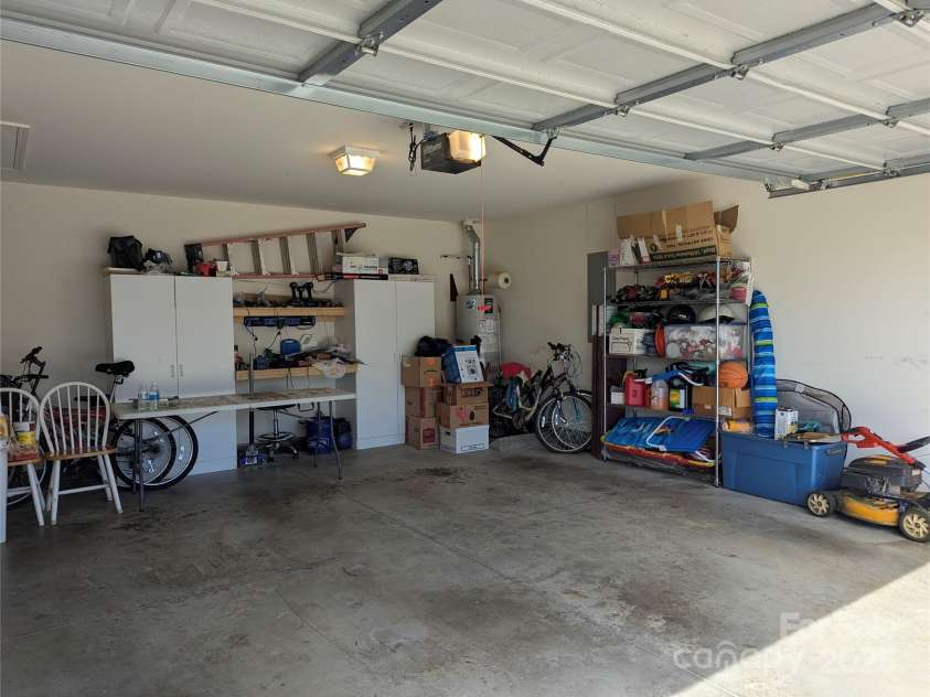 163 Swift Creek Road, Fletcher, NC 28732.  MLS# CAR4250145, YatesRealty ID 19860. Garage/work bench