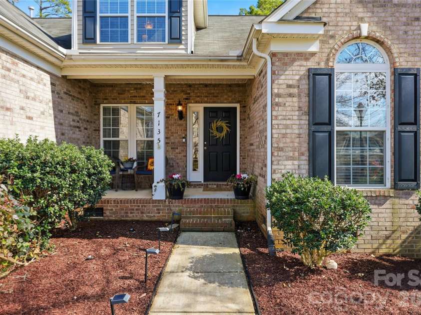 7135 Meyer Road, Fort Mill, SC 29715.  MLS# CAR4377464, YatesRealty ID 19864. Close up of inviting front porch