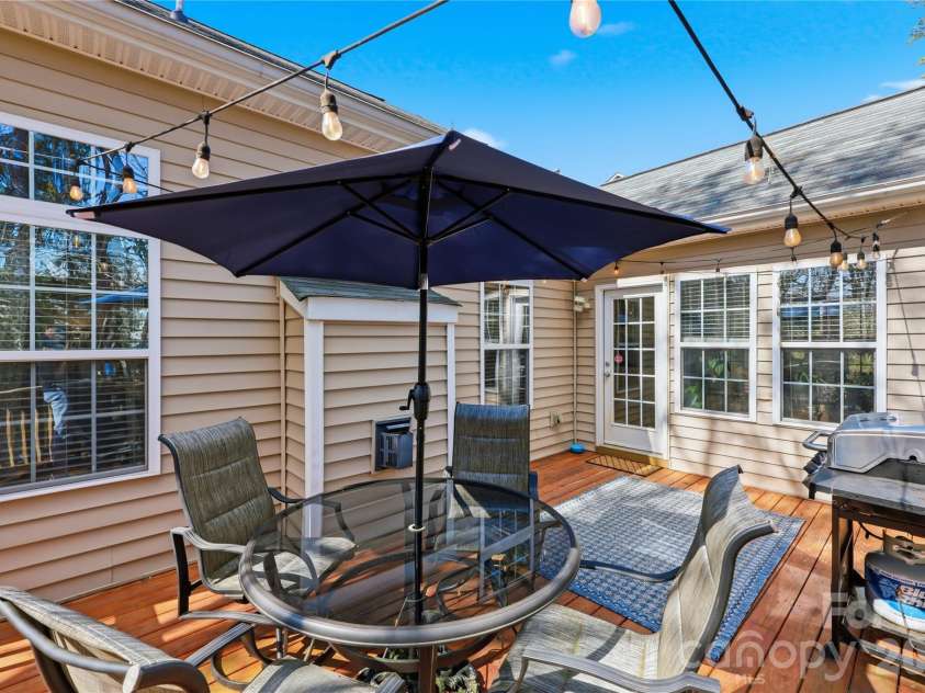 7135 Meyer Road, Fort Mill, SC 29715.  MLS# CAR4377464, YatesRealty ID 19864. Deck with cafe' lights
