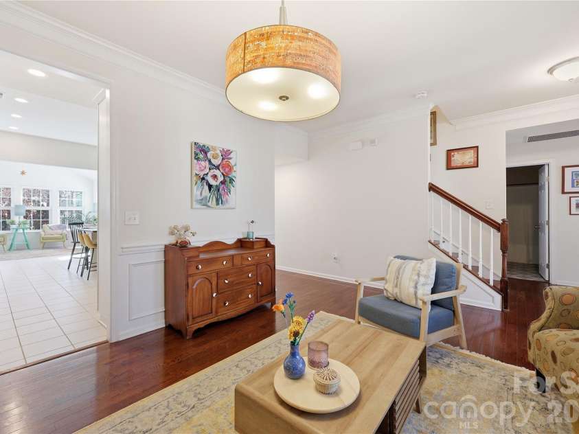 7135 Meyer Road, Fort Mill, SC 29715.  MLS# CAR4377464, YatesRealty ID 19864. From dining room looking into the kitchen and hall.