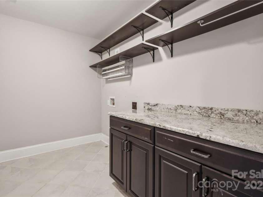 907 Ospre Lane, Fort Mill, SC 29708.  MLS# CAR4254427, YatesRealty ID 19864. Laundry Room - upper floor