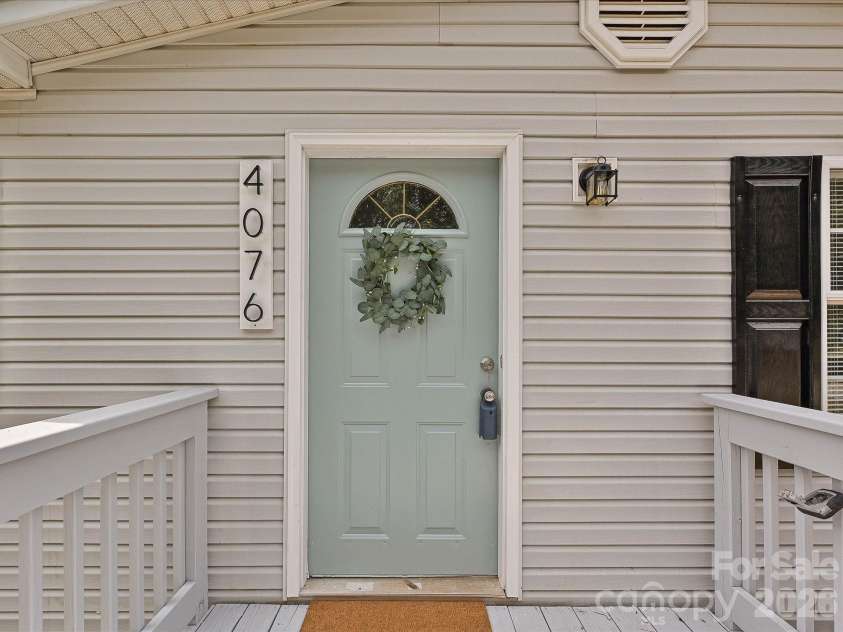 4076 Ritchfield Drive, Lincolnton, NC 28092.  MLS# CAR4376979, YatesRealty ID 19865. Front entry door with custom house numbers, front door wreath and fresh deck & shutters painted. 