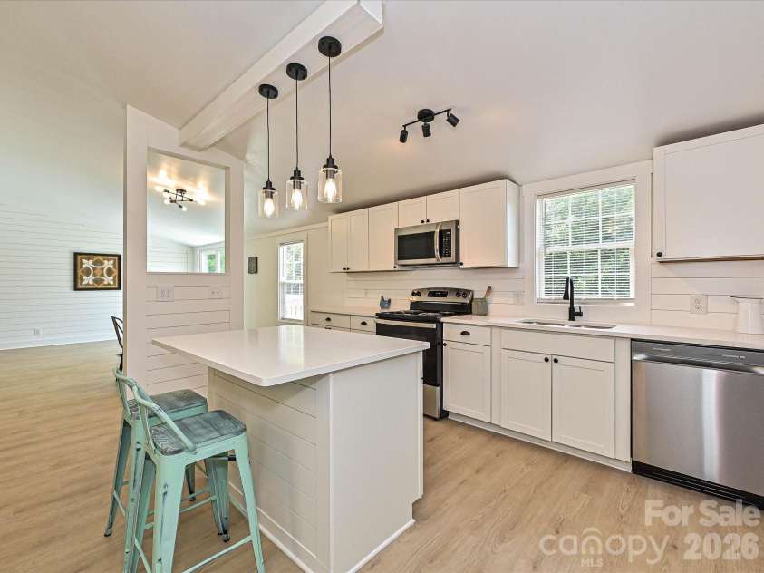 4076 Ritchfield Drive, Lincolnton, NC 28092.  MLS# CAR4376979, YatesRealty ID 19865. View of kitchen overlooking the living room. 