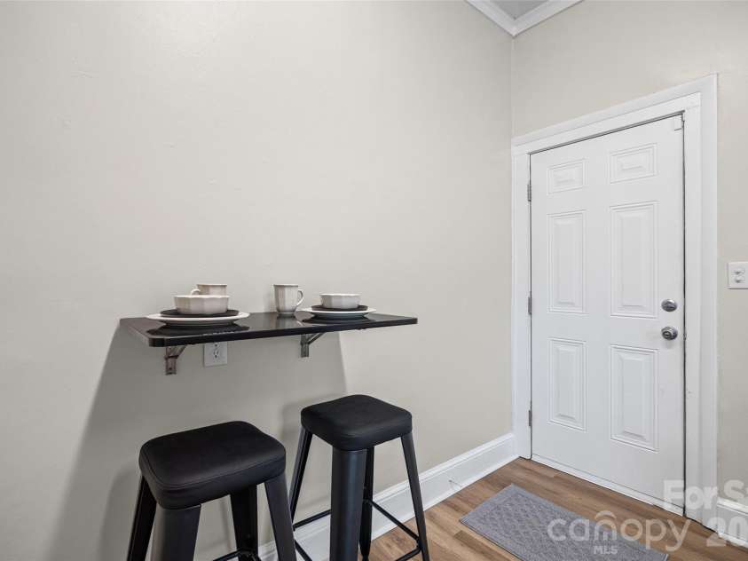323 High Street, Rock Hill, SC 29730.  MLS# CAR4360419, YatesRealty ID 19866. Convenient Fold away table with stools