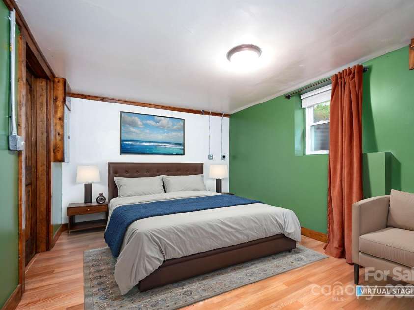 41 Michigan Avenue, Asheville, NC 28806.  MLS# CAR4263731, YatesRealty ID 19868. Basement Bedroom