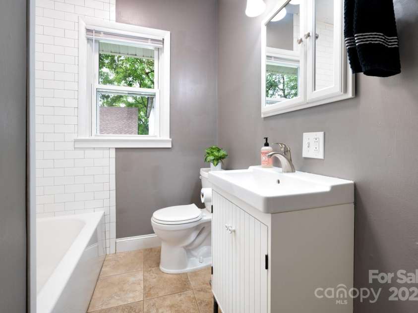 41 Michigan Avenue, Asheville, NC 28806.  MLS# CAR4263731, YatesRealty ID 19868. Updated Main Level Bathroom