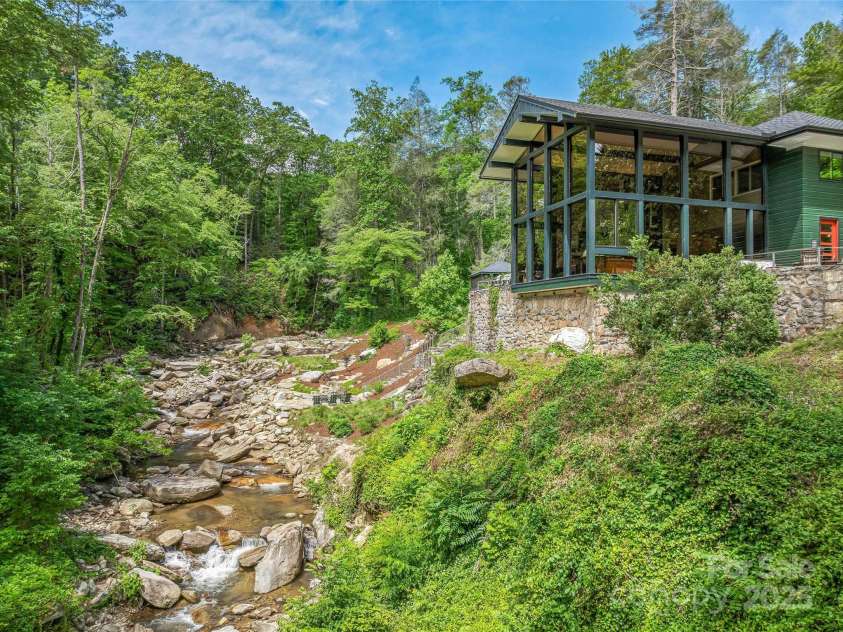 400 Kings Drive, Lake Lure, NC 28746.  MLS# CAR4264882, YatesRealty ID 19869. Amazing views of the flowing creek below.