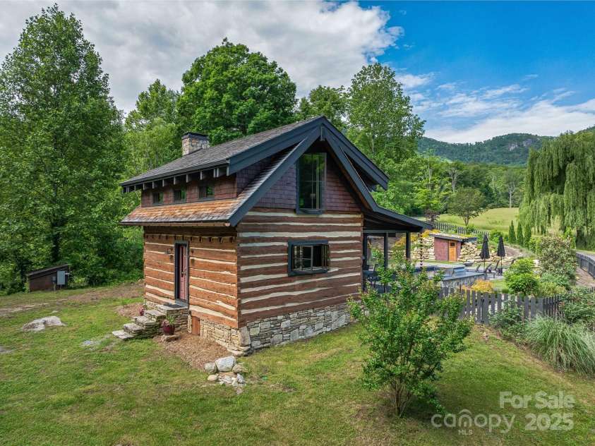 400 Kings Drive, Lake Lure, NC 28746.  MLS# CAR4264882, YatesRealty ID 19869. Cabin was re-chinked and renovated completely. Offering a tranquil retreat to take in the views of the Bald Mountain Range and Eagle Rock in the distance
