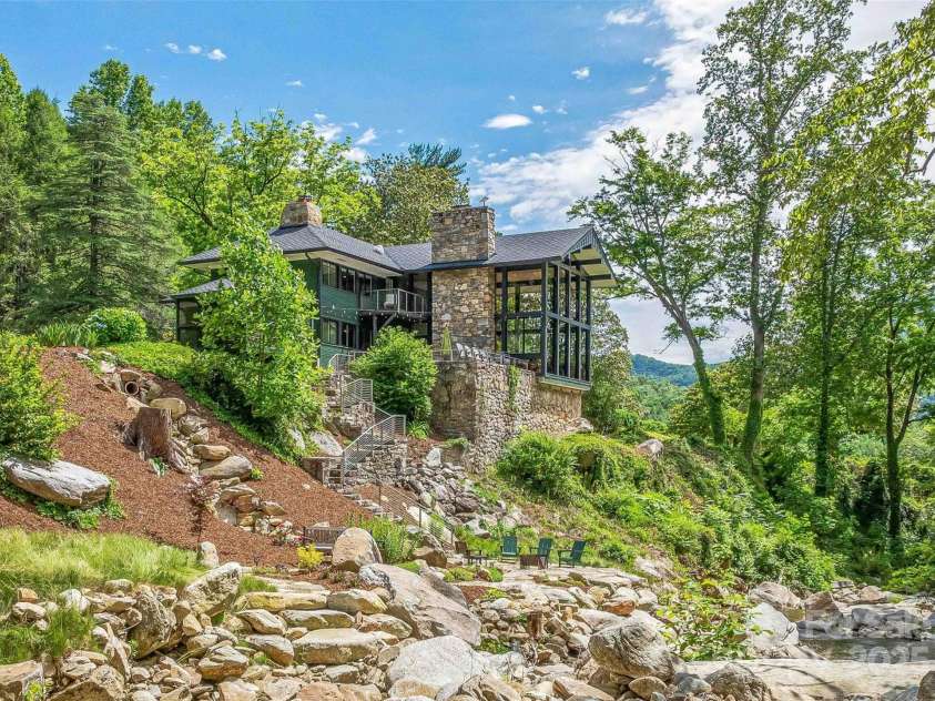 400 Kings Drive, Lake Lure, NC 28746.  MLS# CAR4264882, YatesRealty ID 19869. Luxury living at its finest in this Frank Lloyd Wright inspired mountain home built by Leslie Cheek of Maxwell House Coffee