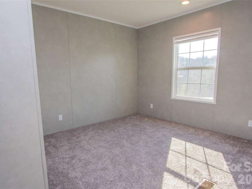 36 Whisper Mountain Road, Hendersonville, NC 28792.  MLS# CAR4373855, YatesRealty ID 19872. Bedroom 2 - Split BR plan