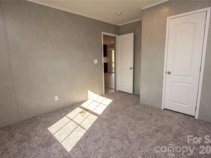 36 Whisper Mountain Road, Hendersonville, NC 28792.  MLS# CAR4373855, YatesRealty ID 19872. Bedroom 2 - Split BR plan