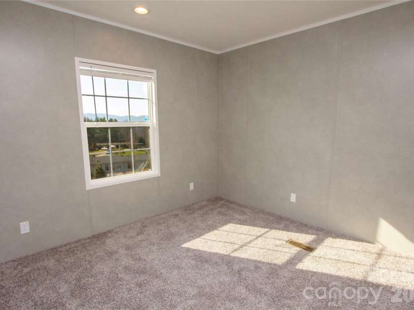 36 Whisper Mountain Road, Hendersonville, NC 28792.  MLS# CAR4373855, YatesRealty ID 19872. Bedroom 3 - Split BR plan