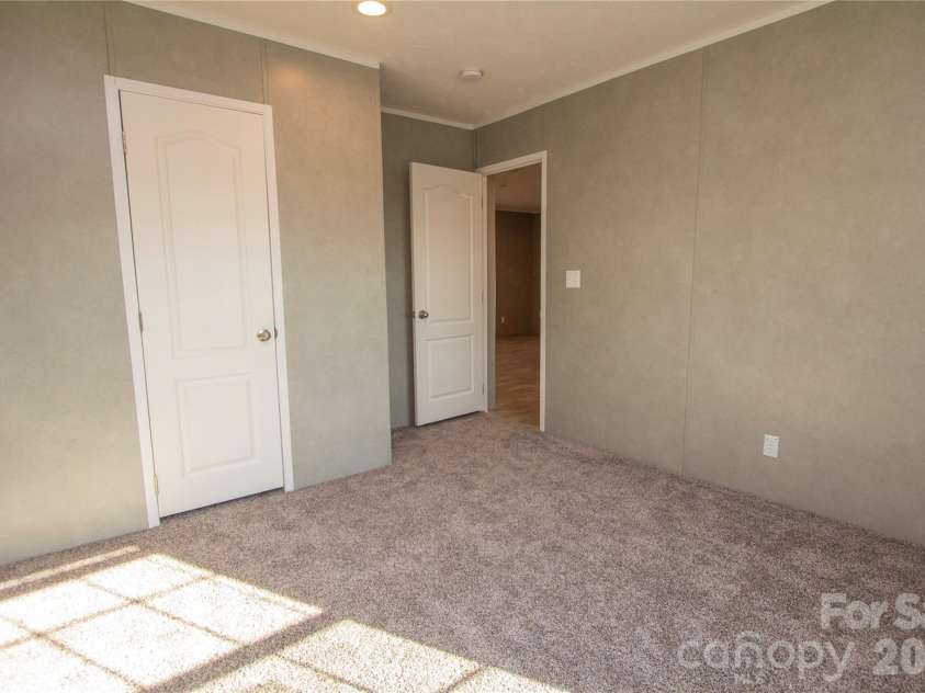 36 Whisper Mountain Road, Hendersonville, NC 28792.  MLS# CAR4373855, YatesRealty ID 19872. Bedroom 3 - Split BR plan