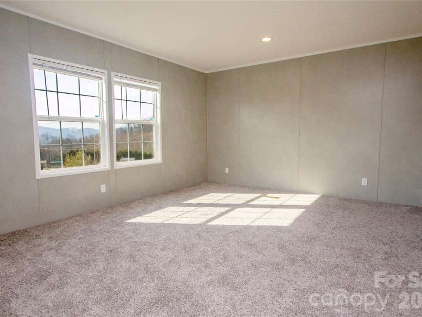 36 Whisper Mountain Road, Hendersonville, NC 28792.  MLS# CAR4373855, YatesRealty ID 19872. Primary BR w/ Mountain Views