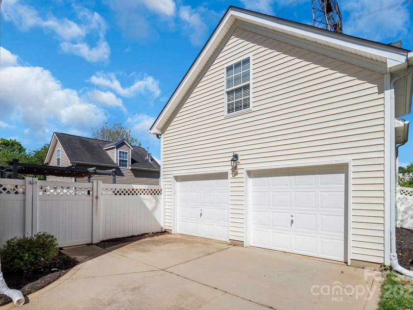 18023 Train Station Drive, Cornelius, NC 28031.  MLS# CAR4198417, YatesRealty ID 19875. Detached 2 car garage and finished living space with private entrance above the garage.