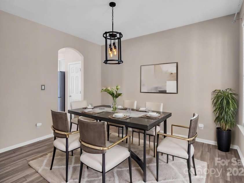 18023 Train Station Drive, Cornelius, NC 28031.  MLS# CAR4198417, YatesRealty ID 19875. Dining room virtually staged to show potential.