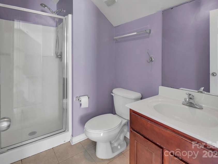 18023 Train Station Drive, Cornelius, NC 28031.  MLS# CAR4198417, YatesRealty ID 19875. Full bath in the detached 2nd living quarters