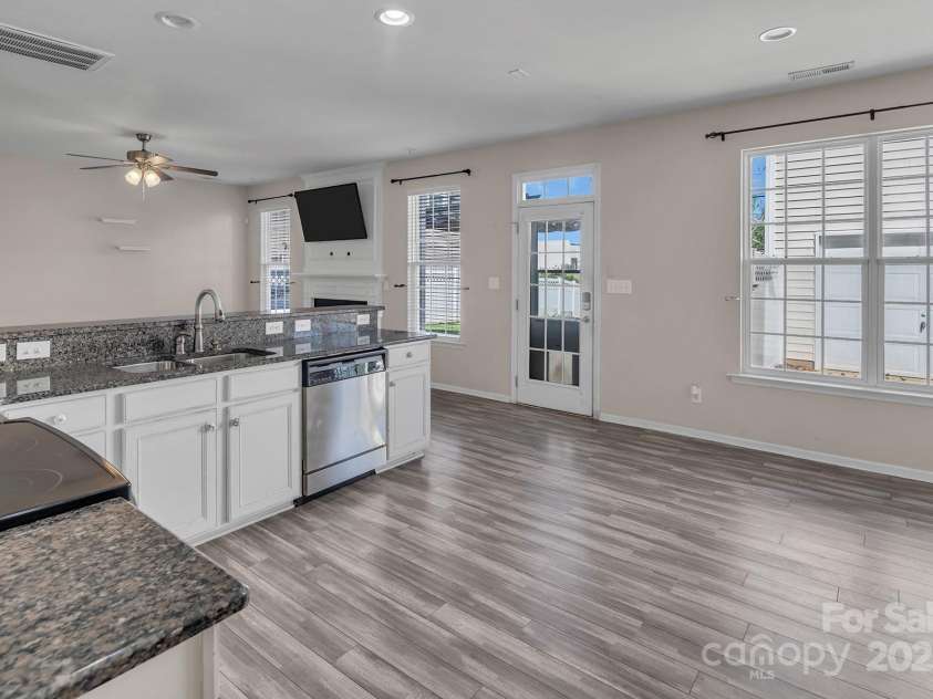 18023 Train Station Drive, Cornelius, NC 28031.  MLS# CAR4198417, YatesRealty ID 19875. Kitchen includes a roomy breakfast area.