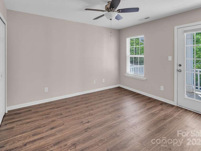 18023 Train Station Drive, Cornelius, NC 28031.  MLS# CAR4198417, YatesRealty ID 19875. Spacious guest bedroom