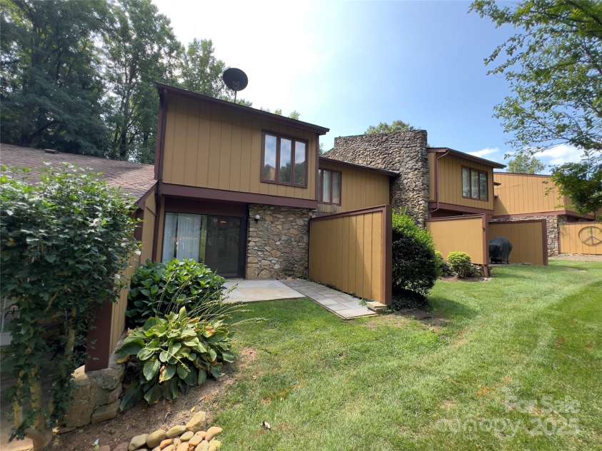 122 Colony Drive, Arden, NC 28704.  MLS# CAR4268368, YatesRealty ID 19876. Back Patio