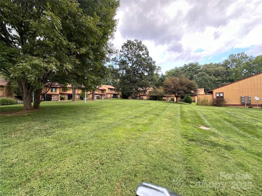 122 Colony Drive, Arden, NC 28704.  MLS# CAR4268368, YatesRealty ID 19876. Community