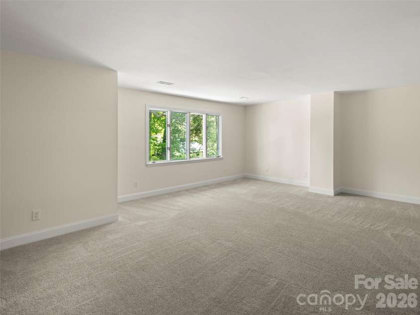 203 Crowfields Drive, Asheville, NC 28803.  MLS# CAR4378938, YatesRealty ID 19877. Gracious primary suite