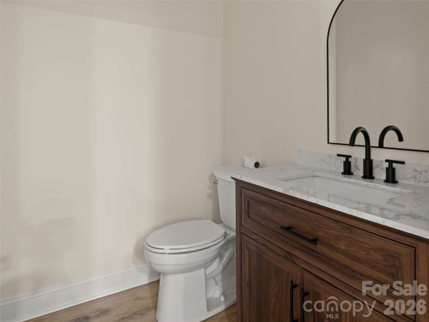 203 Crowfields Drive, Asheville, NC 28803.  MLS# CAR4378938, YatesRealty ID 19877. Main level half bath