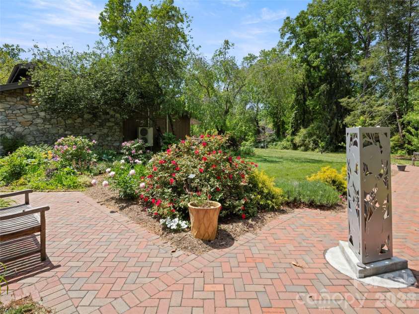 203 Crowfields Drive, Asheville, NC 28803.  MLS# CAR4378938, YatesRealty ID 19877. Manicured grounds