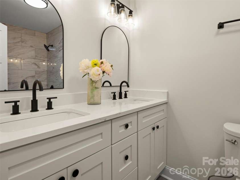 203 Crowfields Drive, Asheville, NC 28803.  MLS# CAR4378938, YatesRealty ID 19877. Primary double vanity