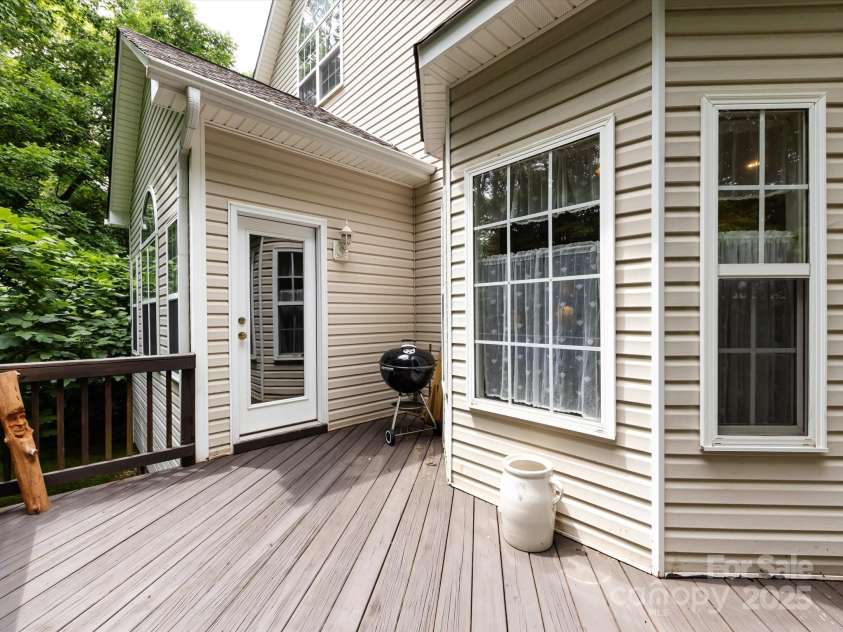 1423 Piper Court, Concord, NC 28025.  MLS# CAR4269356, YatesRealty ID 19879. Access deck from great room or breakfast room