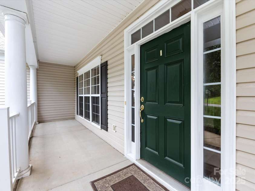 1423 Piper Court, Concord, NC 28025.  MLS# CAR4269356, YatesRealty ID 19879. Large front porch
