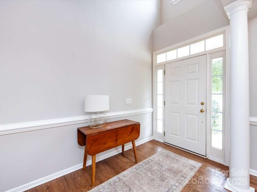 1423 Piper Court, Concord, NC 28025.  MLS# CAR4269356, YatesRealty ID 19879. Two story foyer filled with light